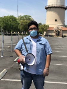 Organizer with bullhorn, Fresno, Ca. Liberation photo. 