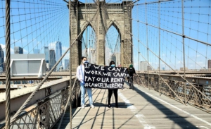 Brooklyn Bridge banner. Liberation photo.